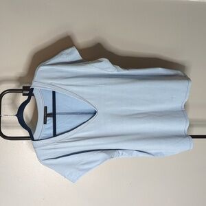 White House. Black market extra large light blue plunge neck soft material shirt